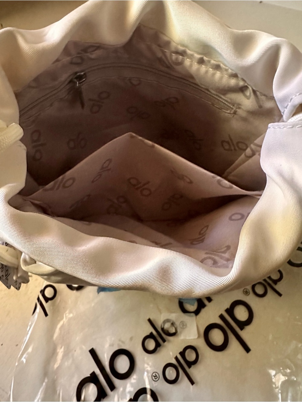 ALO Yoga Cream Drawstring Puffer Mini Crossbody - Picture 7 of 8